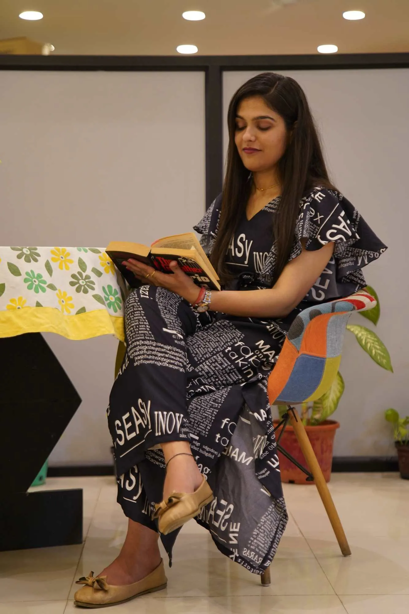 Black Co-Ord set with  pant and stylish flair sleeve top with overall Newspaper Print