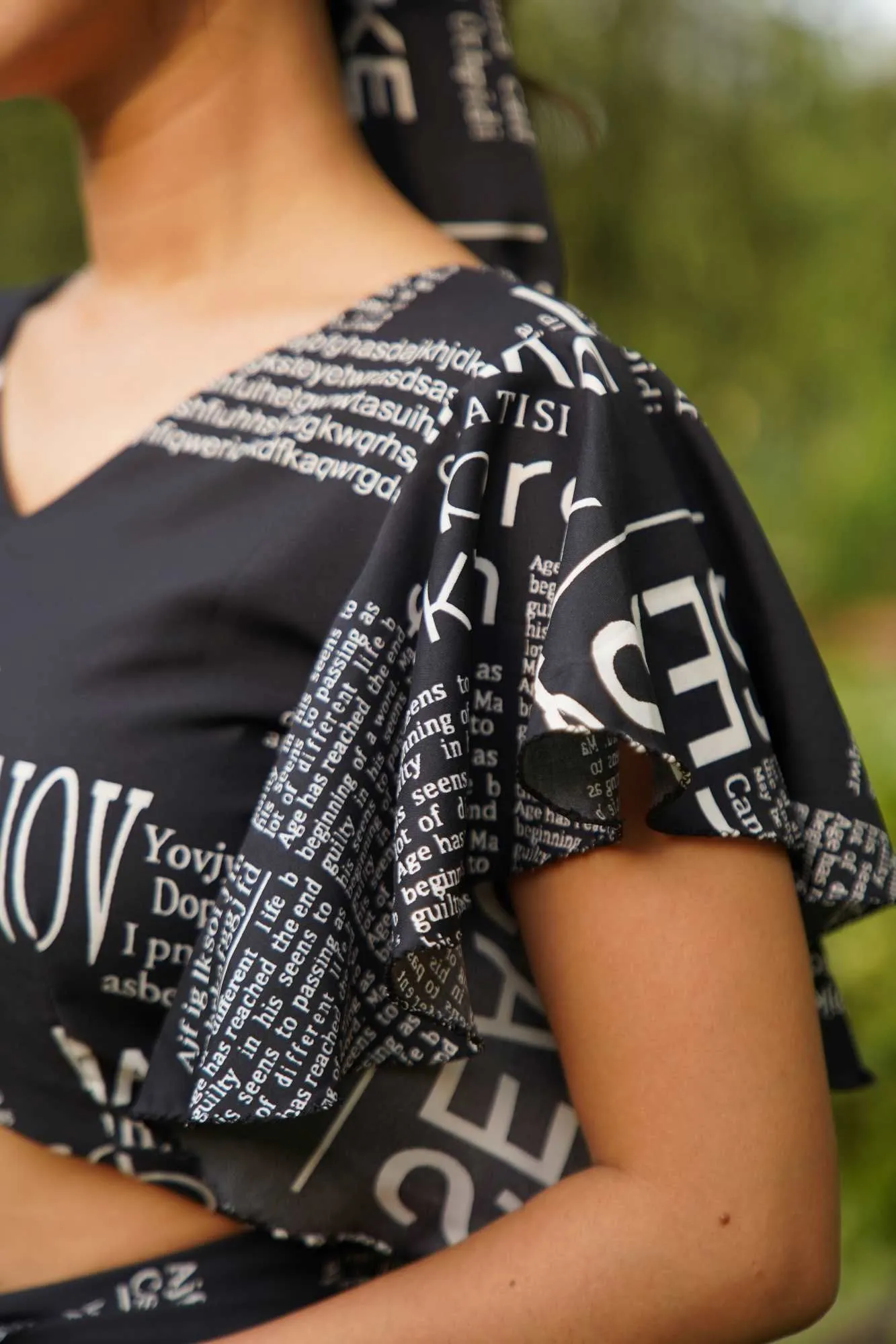 Black Co-Ord set with  pant and stylish flair sleeve top with overall Newspaper Print