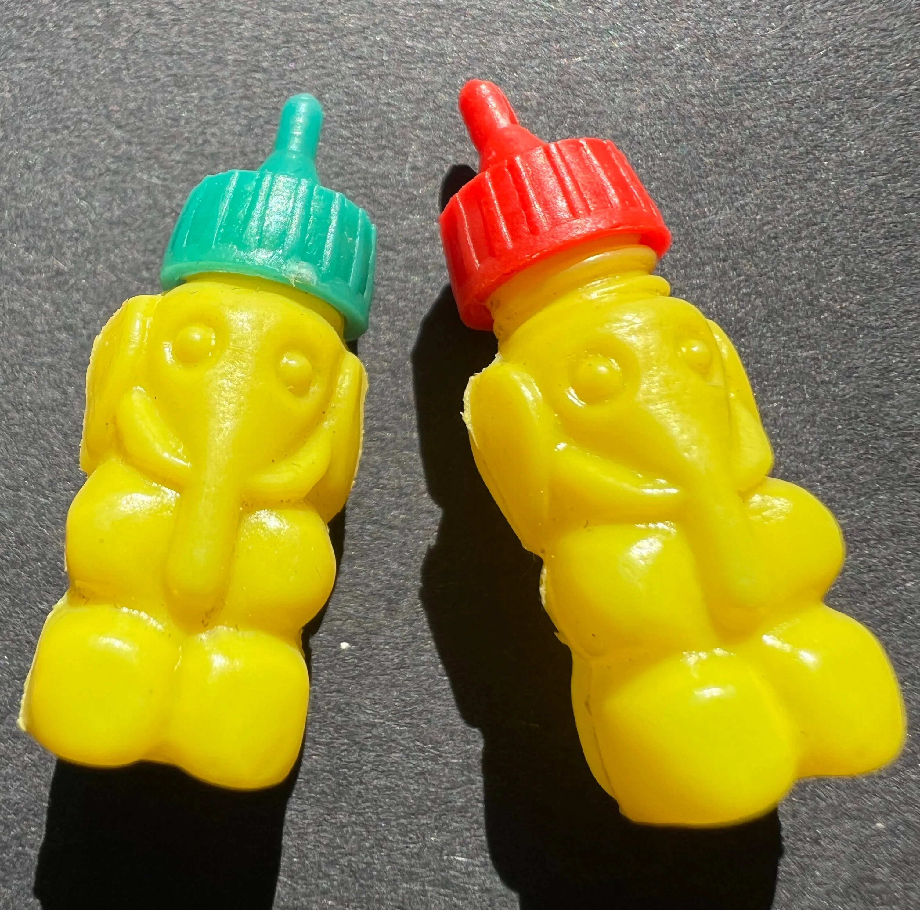 Rather Extraordinary 3cm Vintage Dolls Bottle- Elephant or Grim Face